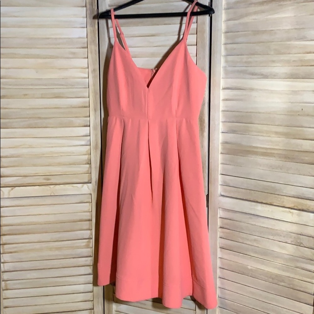 Knee length bright peach dress